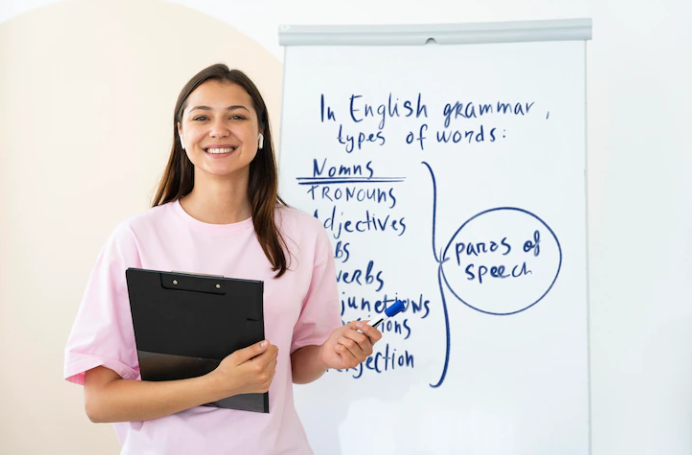 A teacher who is teaching English grammar tips