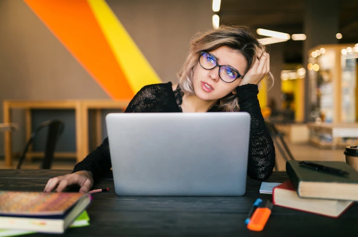 A female student who is preparing for an IELTS test but is stressed