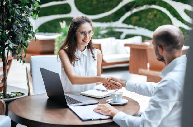 A man and a woman doing a speaking interview