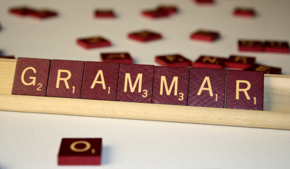 Pieces of wood showing grammar vocabulary