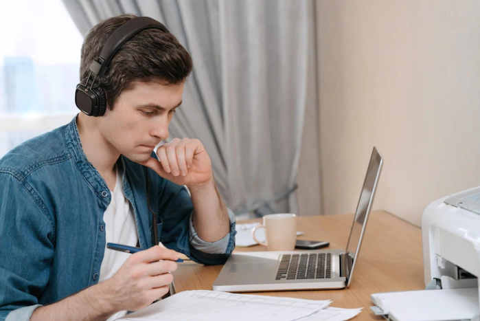 A man thinking about a reading test