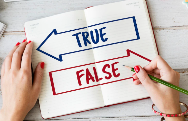 A notebook in which the word True and False is written