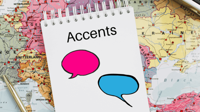 A notebook on which the word accent is written